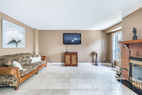 3211 Dovetail Mews, Mississauga, ON - Indoor Photo Showing Living Room With Fireplace