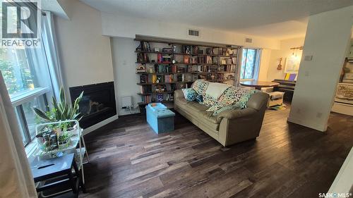66 Gore Place, Regina, SK - Indoor Photo Showing Living Room With Fireplace