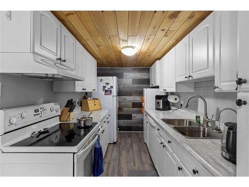 102 Main Road, Bellevue, NL - Indoor Photo Showing Kitchen With Double Sink