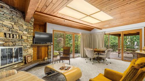 231 Glenacres Road, Nakusp, BC - Indoor Photo Showing Living Room With Fireplace