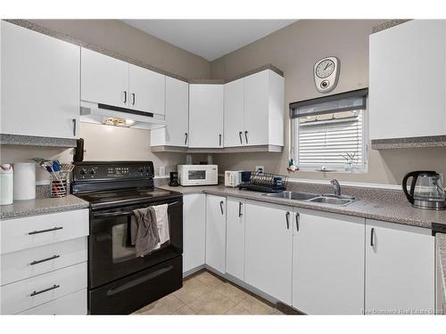 76-78 Belleview Ave, Moncton, NB - Indoor Photo Showing Kitchen With Double Sink