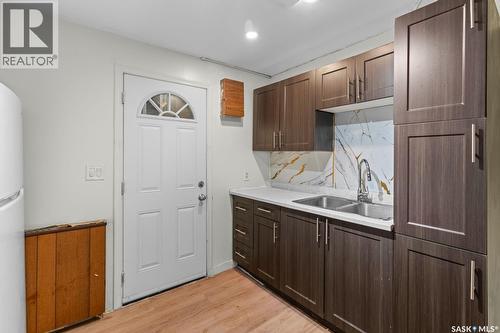 410 P Avenue N, Saskatoon, SK - Indoor Photo Showing Kitchen With Double Sink