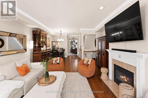 52 Kings Landing Private, Ottawa, ON - Indoor Photo Showing Living Room With Fireplace