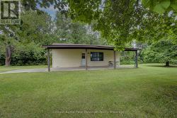 View from east of home and carport. - 