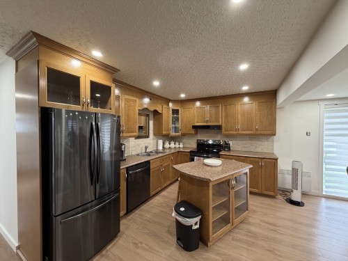 Cuisine - 15 2E Avenue E., Paspébiac, QC - Indoor Photo Showing Kitchen With Double Sink