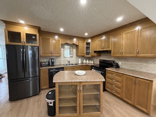 Cuisine - 15 2E Avenue E., Paspébiac, QC - Indoor Photo Showing Kitchen With Double Sink