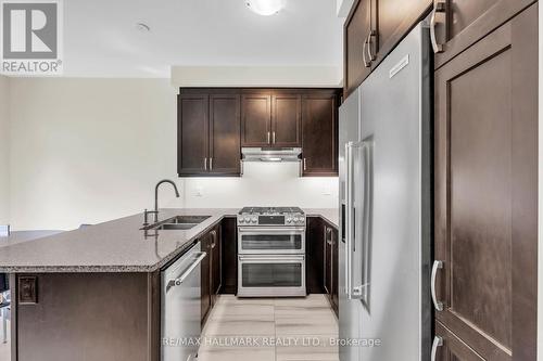 14 Eberly Woods Drive, Markham, ON - Indoor Photo Showing Kitchen With Double Sink With Upgraded Kitchen