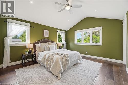 Vaulted ceiling room with wood-finish flooring - 266 Ferndale Place, Waterloo, ON - Indoor Photo Showing Bedroom
