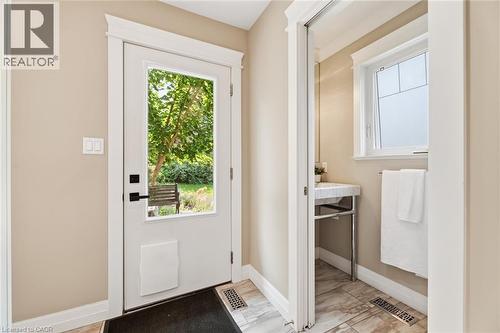 Entryway featuring a white door with a clear glass insert and black hardware - 266 Ferndale Place, Waterloo, ON - Indoor Photo Showing Other Room