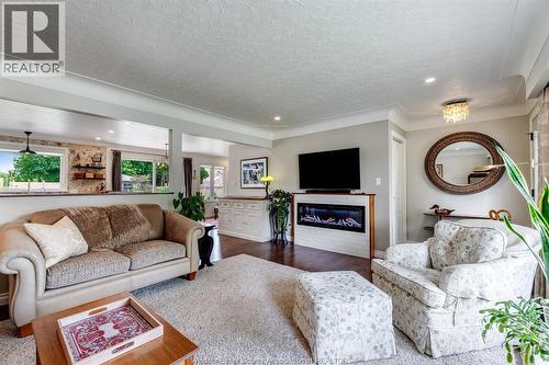 9 Margaret, Leamington, ON - Indoor Photo Showing Living Room With Fireplace