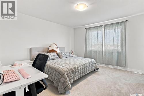 65 651 Dubois Crescent, Saskatoon, SK - Indoor Photo Showing Bedroom