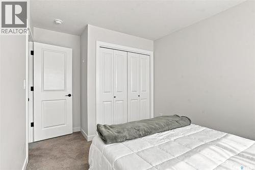 65 651 Dubois Crescent, Saskatoon, SK - Indoor Photo Showing Bedroom