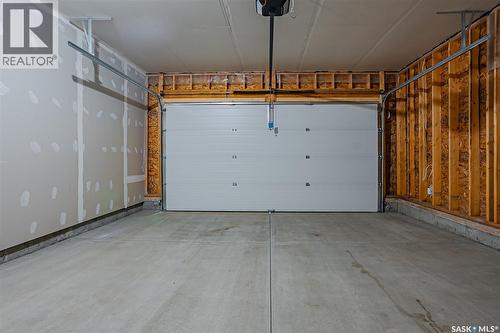 65 651 Dubois Crescent, Saskatoon, SK - Indoor Photo Showing Garage