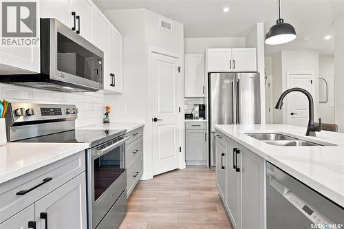 65 651 Dubois Crescent, Saskatoon, SK - Indoor Photo Showing Kitchen With Stainless Steel Kitchen With Double Sink With Upgraded Kitchen