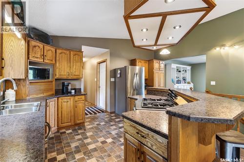 1601 100A Street, Tisdale, SK - Indoor Photo Showing Kitchen With Double Sink
