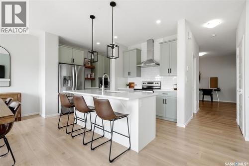 5209 E Green Crescent, Regina, SK - Indoor Photo Showing Kitchen With Stainless Steel Kitchen With Upgraded Kitchen