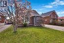 Brick exterior with an asphalt shingle roof - 371 Ottawa Street S, Kitchener, ON  - Outdoor 