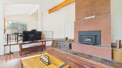 5740 Kennedy Road, Cranbrook, BC - Indoor Photo Showing Living Room With Fireplace