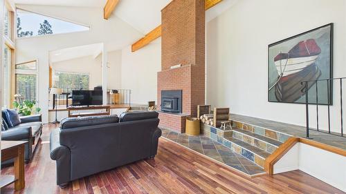 5740 Kennedy Road, Cranbrook, BC - Indoor Photo Showing Other Room With Fireplace