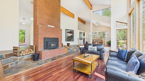5740 Kennedy Road, Cranbrook, BC - Indoor Photo Showing Living Room With Fireplace