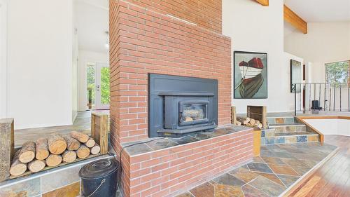 5740 Kennedy Road, Cranbrook, BC - Indoor Photo Showing Living Room With Fireplace