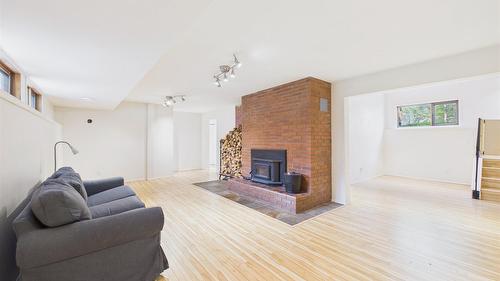 5740 Kennedy Road, Cranbrook, BC - Indoor Photo Showing Living Room With Fireplace