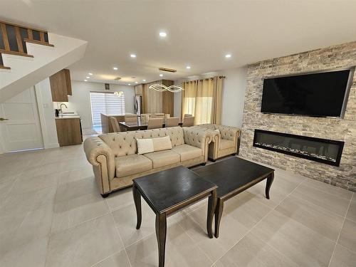 58 England Circle, Charlottetown, PE - Indoor Photo Showing Living Room With Fireplace