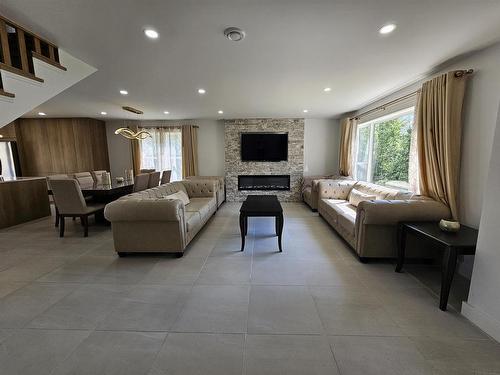 58 England Circle, Charlottetown, PE - Indoor Photo Showing Living Room With Fireplace