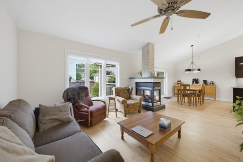 Salon - 314 Av. De L'Étang, Mascouche, QC - Indoor Photo Showing Living Room With Fireplace