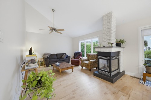 Salon - 314 Av. De L'Étang, Mascouche, QC - Indoor Photo Showing Living Room With Fireplace