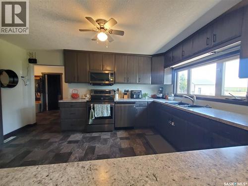 Neville Acreage, Neville, SK - Indoor Photo Showing Kitchen With Double Sink