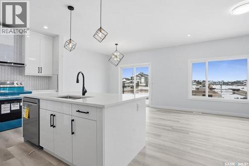 783 Nazarali Union, Saskatoon, SK - Indoor Photo Showing Kitchen With Double Sink