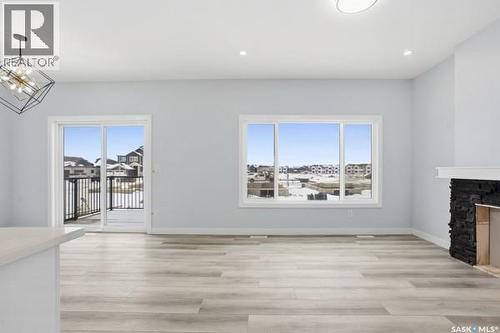 783 Nazarali Union, Saskatoon, SK - Indoor Photo Showing Other Room With Fireplace