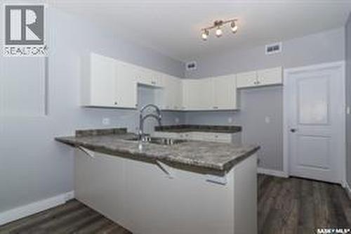407 Boykowich Street, Saskatoon, SK - Indoor Photo Showing Kitchen With Double Sink