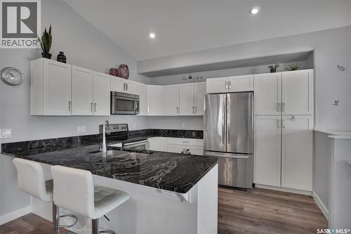 407 Boykowich Street, Saskatoon, SK - Indoor Photo Showing Kitchen With Stainless Steel Kitchen With Double Sink With Upgraded Kitchen