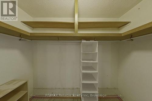 Primary Bedroom Walk-In Closet - 117 Tamarack Drive, Central Huron (Goderich), ON - Indoor With Storage