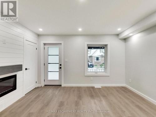 67 Cope Street, Hamilton, ON - Indoor Photo Showing Other Room With Fireplace