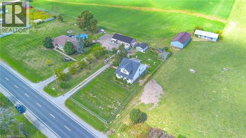 Expansive property featuring two distinct residential structures, multiple outbuildings, and a large inground pool - 3211 Highway 3, Jarvis, ON -  With View