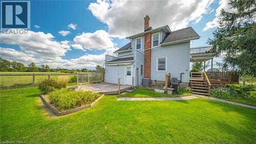 Expansive green lawn surrounds a multi-level outdoor living space - 3211 Highway 3, Jarvis, ON - Outdoor