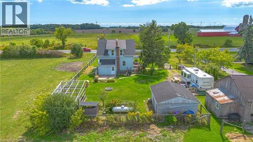 Two-story residence with light blue siding and a dark shingle roof - 3211 Highway 3, Jarvis, ON - Outdoor With View