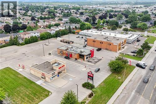 Commercial properties with expansive paved parking areas - 7332 Twenty Road E, Glanbrook, ON - Outdoor With View