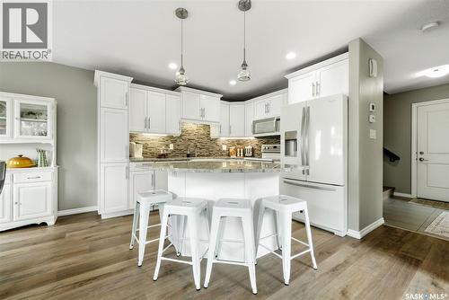 213 4002 Sandhill Crescent, Regina, SK - Indoor Photo Showing Kitchen With Upgraded Kitchen