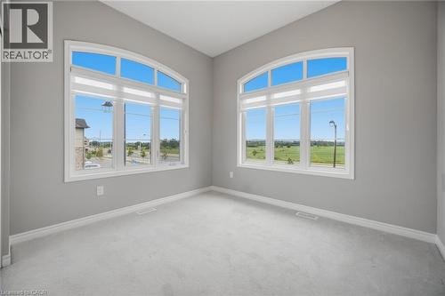 Room featuring light gray carpet flooring and matching painted walls - 542 Boyd Lane, Milton, ON - Indoor Photo Showing Other Room