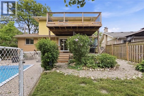 Virtually Staged - 101 Crosby Drive, Kitchener, ON - Outdoor With In Ground Pool With Deck Patio Veranda