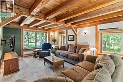 LIVING ROOM WITH VIEWS OF THE POND - 