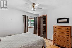 PRIMARY BEDROOM W/ WALK IN CLOSET - 
