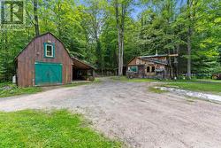 HEATED ONE CAR GARAGE WITH LOFT & WORKSHOP/SHED - 
