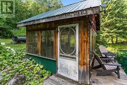 SCREENED IN GAZEBO WITH DOCK ON THE POND - 