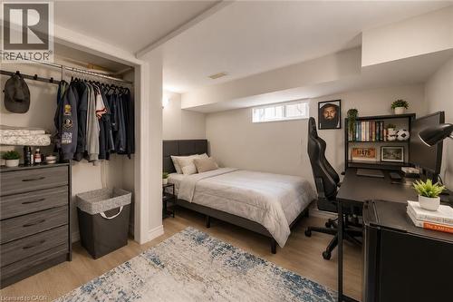 Bedroom featuring light wood-finish flooring and neutral wall tones - 74 Royal Avenue, Hamilton, ON - Indoor Photo Showing Other Room