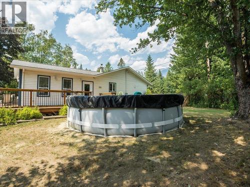 2451 Cunningham Road, Slocan Park, BC - Outdoor With Above Ground Pool With Deck Patio Veranda
